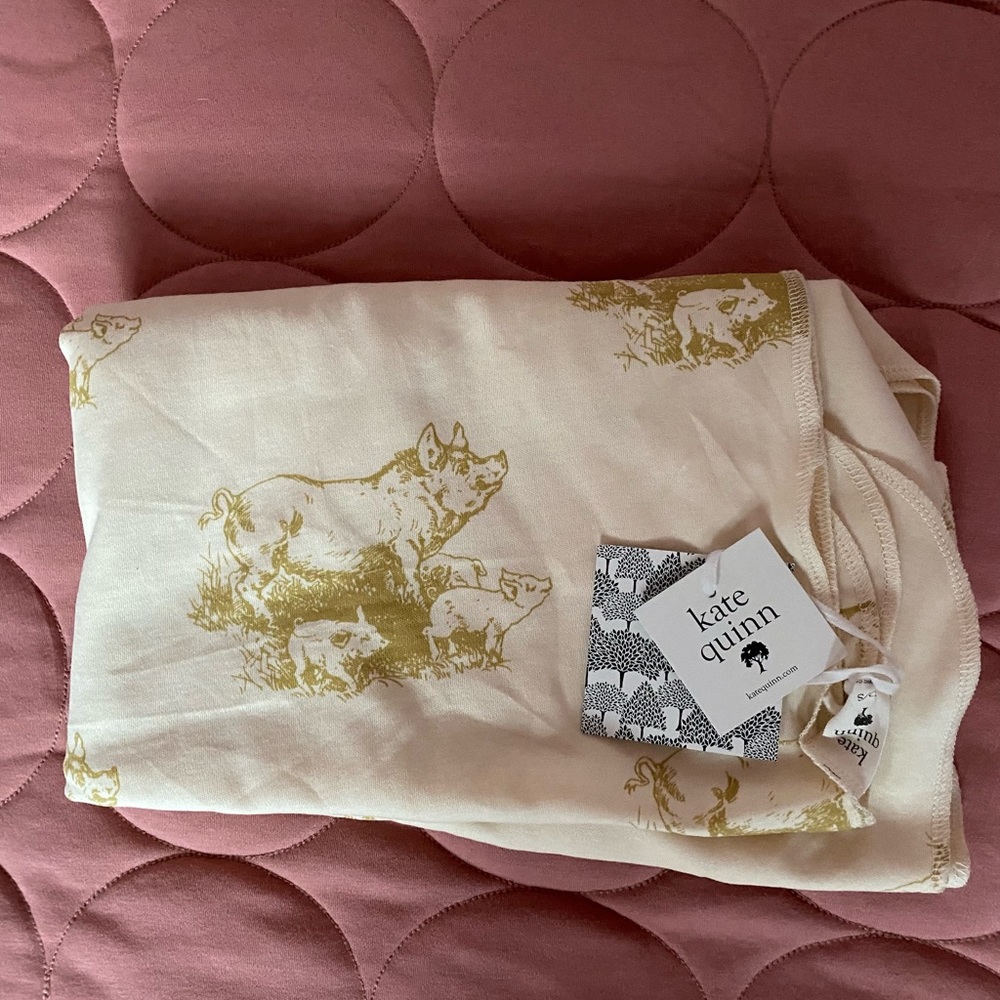 Kate Quinn piggies swaddle